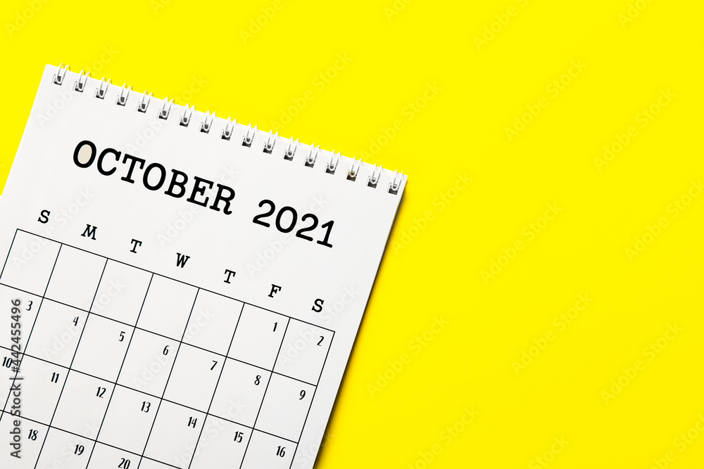 Flip paper calendar on color background