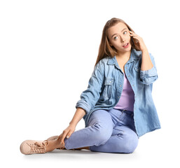 Sticker - Young woman talking by mobile phone on white background