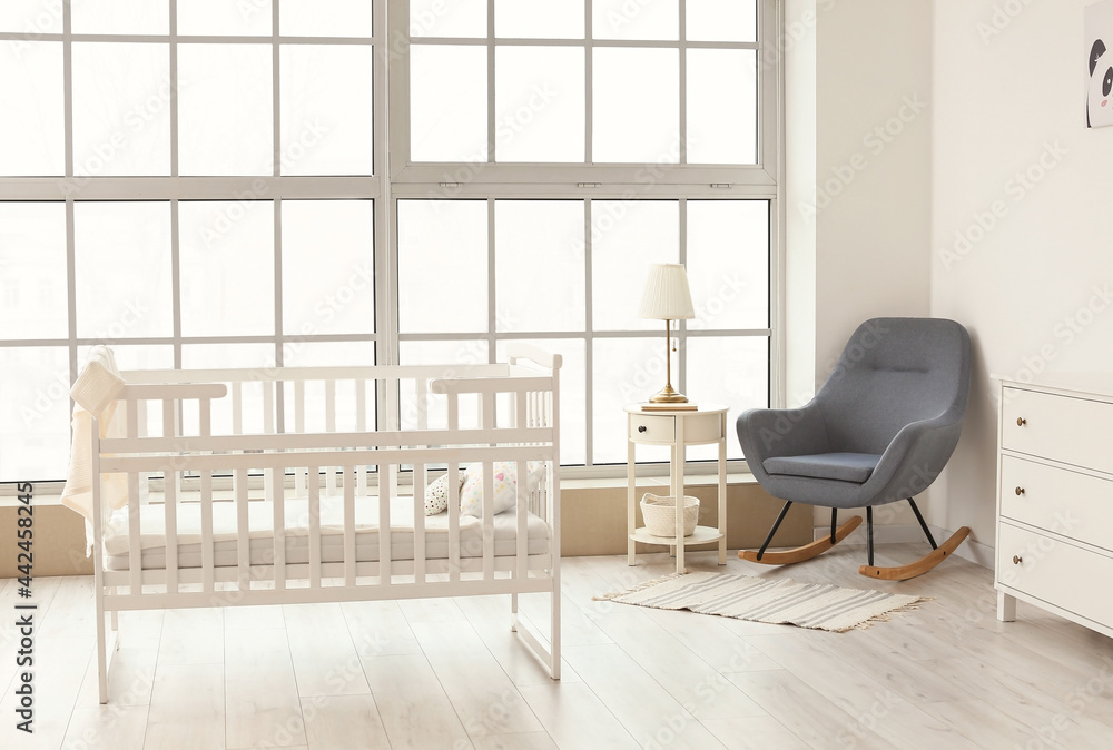 Interior of stylish children's room with comfortable bed