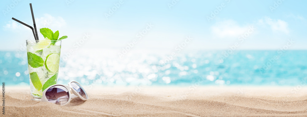 Sea beach with hot sand, palm leaves and cocktail - obrazy, fototapety, plakaty 