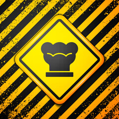 Sticker - Black Chef hat icon isolated on yellow background. Cooking symbol. Cooks hat. Warning sign. Vector