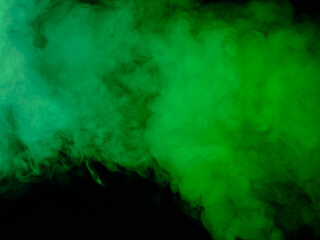 Green smoke texture on black background