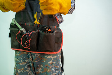 Aufkleber - Electrician with a safety helmet and bunch of wires indoors.
