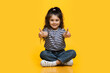 © Prostock-studio - Portrait Of Cute Little Smiling Arab Girl Showing Thumbs Up At Camera