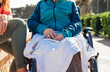 © ADDICTIVE STOCK - Crop caregiver sitting aged woman in wheelchair