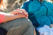 © ADDICTIVE STOCK - Crop caregiver holding hand of aged woman in wheelchair
