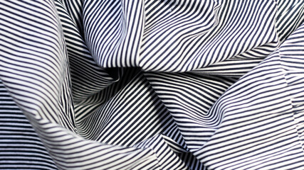 Striped fabric, folded material with pleats