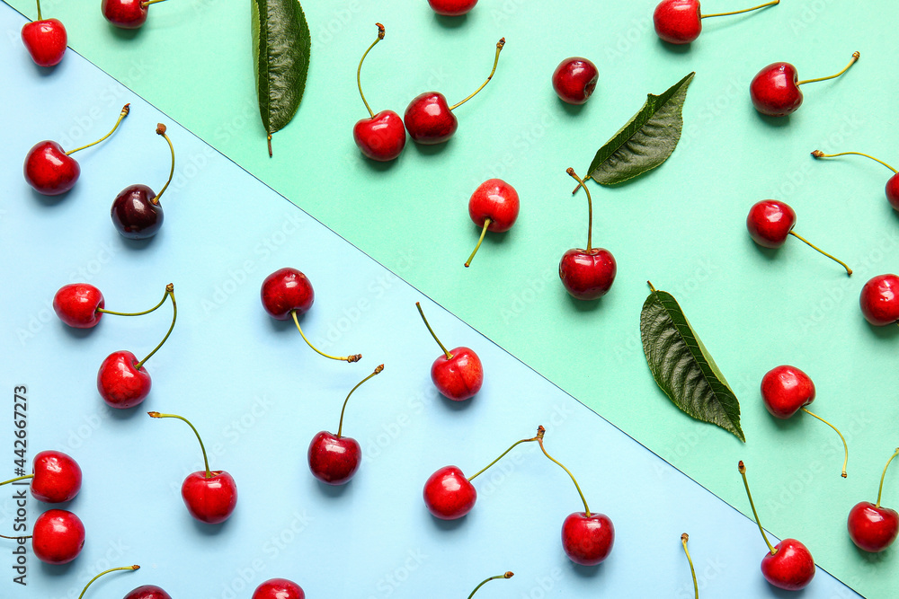 Tasty ripe cherry on color background