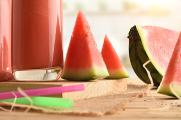 Wall Mural - Watermelon juice with milk and portions of fruit close up