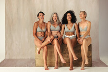 Full Body Shot Of Four Natural Women Of Different Ages