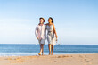 © malajscy - Young couple enjoying time together on the beach
