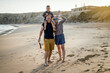 © malajscy - The family with two small boys enjoying time on the beach in Portugal