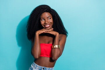 Sticker - Photo of happy nice attractive young afro american woman look empty space adore isolated on blue color background