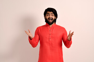 Wall Mural - Surprised happy bearded man in Kurta looking camera with opened mouth 