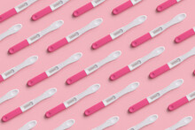 Pattern Of Pregnancy Test On Pink Background