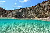 Fototapeta Most - Underwater split photo of beautiful beach of Kalogria with emerald crystal clear sea, Milos island, Cyclades, Greece