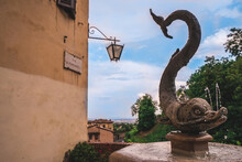 Street Fountain In The Shape Of A Fish In Siena, Italy