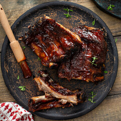 Wall Mural - Grilled barbeque ribs with BBQ sauce and sides