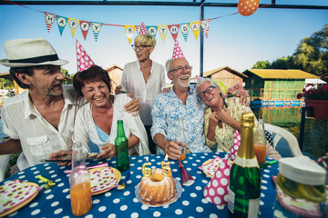 Group of seniors celebrating birthday. Young at heart