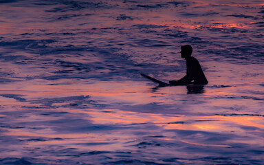 Surfer waiting for a wave