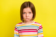 Photo of young unhappy small upset girl bad mood cry face bite lip isolated on shine yellow color background