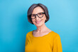 © deagreez - Portrait of attractive cheerful content wise woman wearing specs eye sight vision view isolated over vivid blue color background