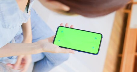 Sticker - woman with green screen smartphone