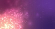 Glowing pink particles effervescing on a dark purple background
