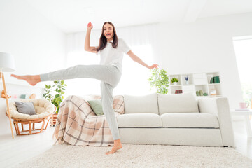 Poster - Photo of crazy carefree positive lady dance have fun barefoot enjoy weekend wear white t-shirt in room indoors