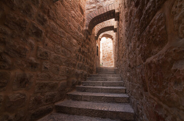 Jerusalem Old City street with steps and arches