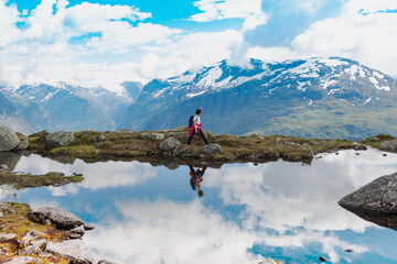 hiker on the top of mountain , Loen Norway