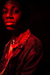 © ADDICTIVE STOCK - Black guy in under red light