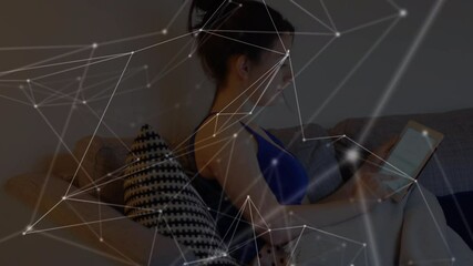 Sticker - Animation of networks of connections with icons over woman using tablet