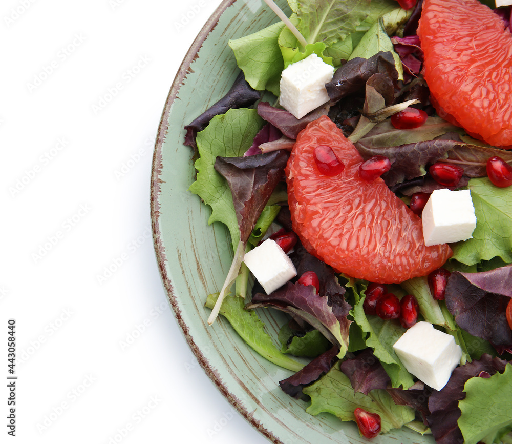 Plate with tasty grapefruit salad on white background, closeup