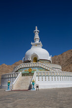 White Buddhist Stupa Or Pagoda In Tibetan Monastery Near Village Leh In Ladakh, Noth India