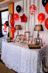 Wall Mural - Delicious sweet buffet with cupcakes. Sweet holiday buffet with cupcakes and other desserts. Candy Bar.