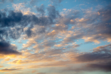 Rain clouds in the sky at sunset