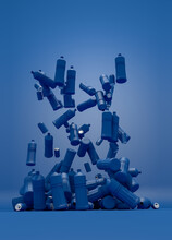 Plastic Bottles And Blue Cans On Blue Background.