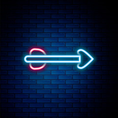 Sticker - Glowing neon line Arrow icon isolated on brick wall background. Colorful outline concept. Vector