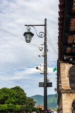 Security Cameras At A Corner Street Pole In Antigua Guatemala