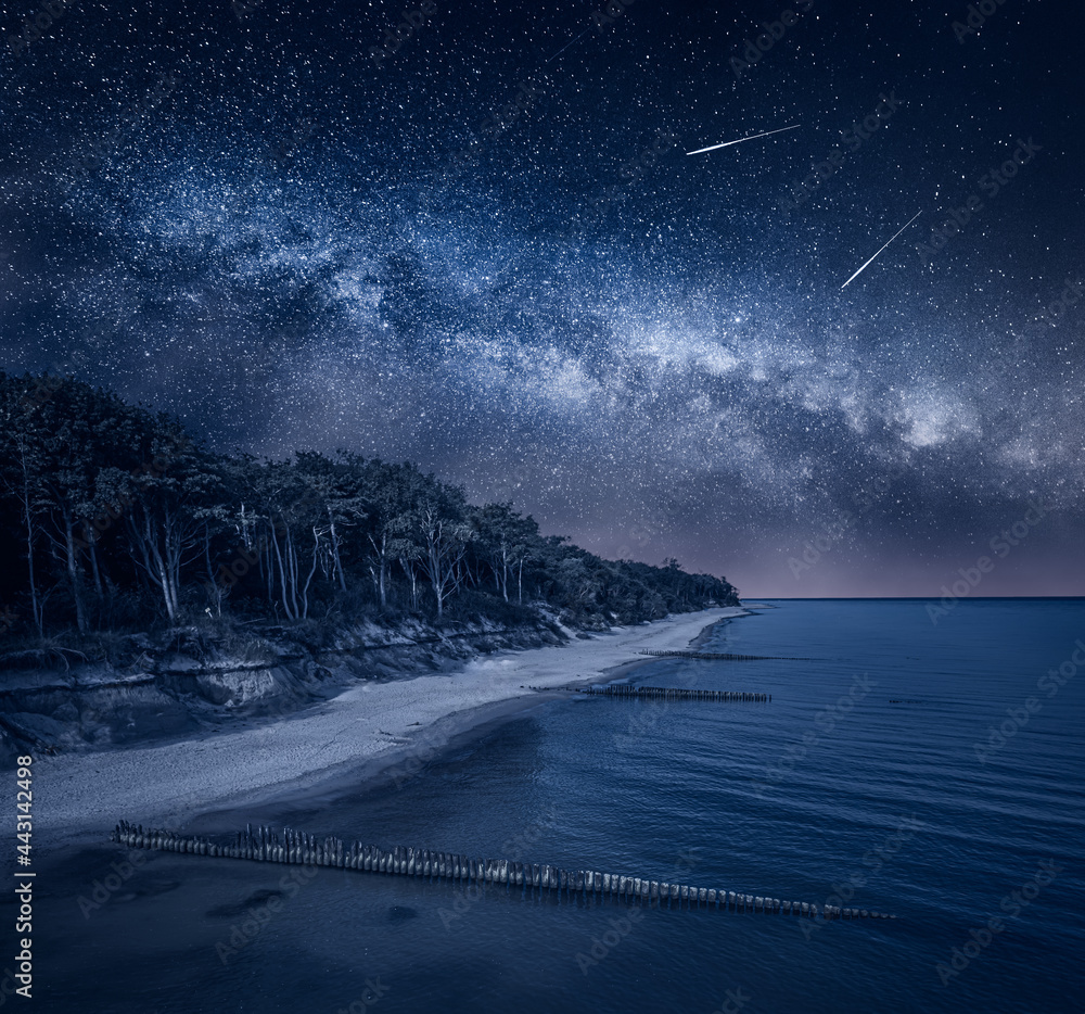 Milky way over Lighthouse by Baltic sea. Beach with stars - obrazy, fototapety, plakaty 