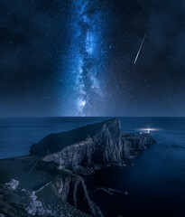 Wall Mural - milky way and neist point lighthouse, isle of skye, scotland