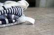 label for clothing color stripe background concept on a wooden table striped fabrics