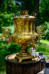 Vertical photo of vintage outdoor samovar