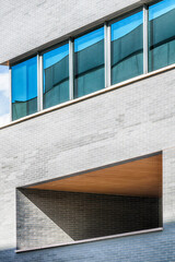 Poster - Urban modern architecture. Close up of a contemporary office building facade.