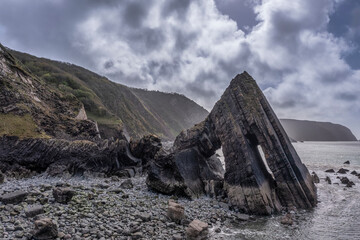 Wall Mural - stunning aerial drone flying landscape image of blackchurch rock on devonian geological formation