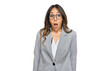 © Krakenimages.com - Young brunette woman wearing business clothes afraid and shocked with surprise expression, fear and excited face.