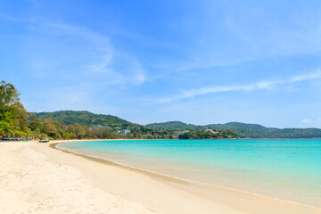 Wall Mural - kata beach with crystal clear water and wave, famous tourist destination and resort area, phuket, th