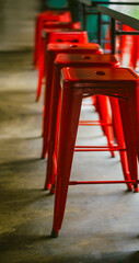 Wall Mural - red bar stools in light and shadow