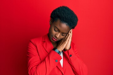 Sticker - Young african american girl wearing business clothes sleeping tired dreaming and posing with hands together while smiling with closed eyes.